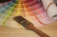 Paint tools laid out on a job site