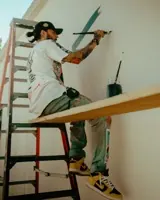 A pitched roof mid-repair